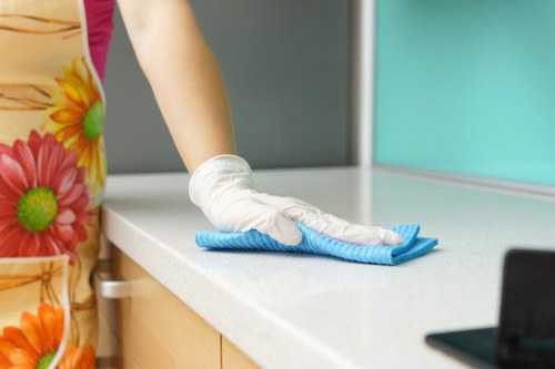 Deep upholstery cleaning removing stains from a fabric sofa